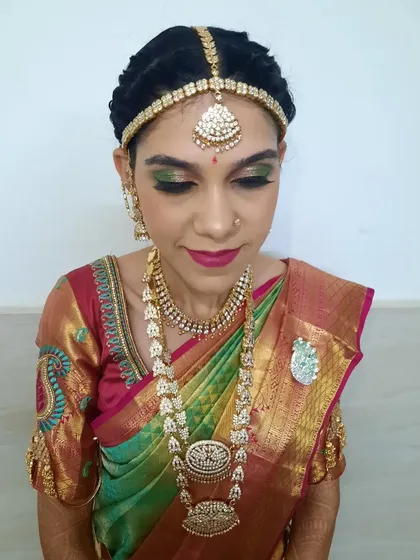 A clear, well-lit shot of the Varapooja makeup, perfect for seeing the true colors and finish on the skin.