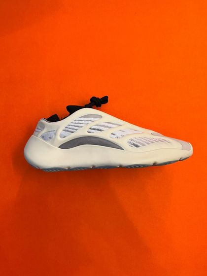 We also source Yeezys. Pictured here is the Adidas Yeezy 700 V3 'Azael', known for its futuristic design and glow-in-the-dark cage.