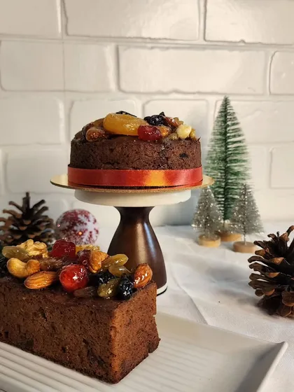 My Christmas Fruit Cake is available as a full loaf or a smaller round cake, perfect for gifting or enjoying with your family.