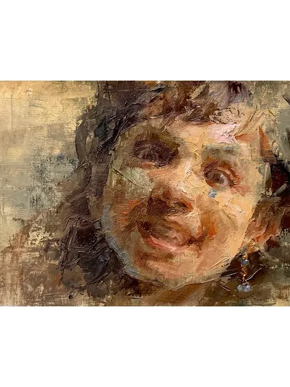 A horizontal composition of "The Smile Spectrum," showing a child's joyful expression.
