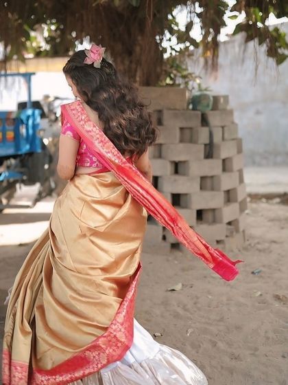 A back view of the stunning saree and hairstyle for the Ganesh Poojan.