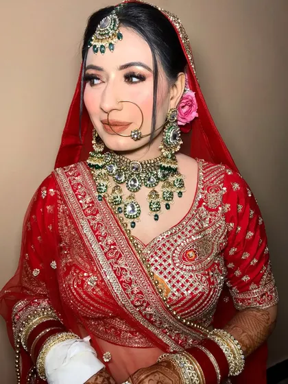The side profile shows the addition of a fresh rose to her hair, a small detail that enhances the entire look.