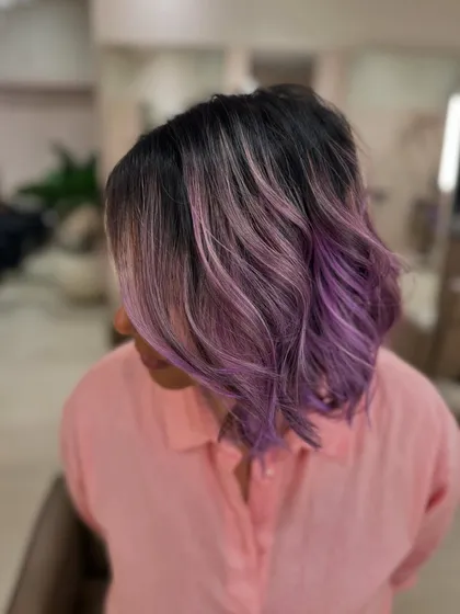 Fresh Lilac love. This soft purple balayage on a short bob is a dreamy, pastel look. This is a bleach color, perfect for a subtle take on fashion shades.