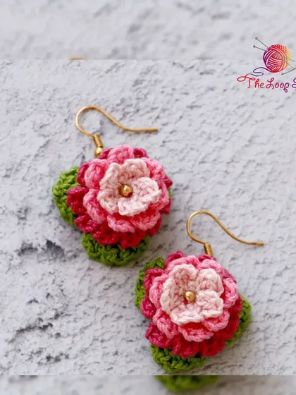 Intricate, lightweight, and full of color. These handmade crochet earrings feature layered petals in shades of pink, creating a beautiful floral accessory that's comfortable enough to wear all day.