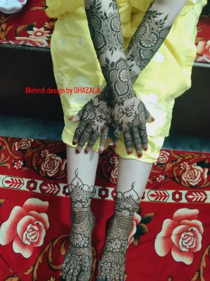 A complete bridal look with matching designs on the hands and feet.