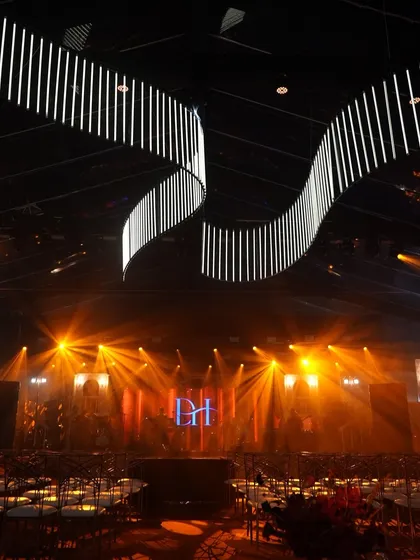 This is the calm before the party. A look at the custom stage and lighting rig we built for a high-energy Sangeet, featuring a massive LED backdrop and kinetic light installation designed to sync with the music.