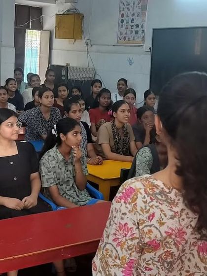 Students at DCCW Trilokpuri listen attentively during a discussion about the challenges they face. Our sessions combine music with heartfelt conversations to create a supportive environment.