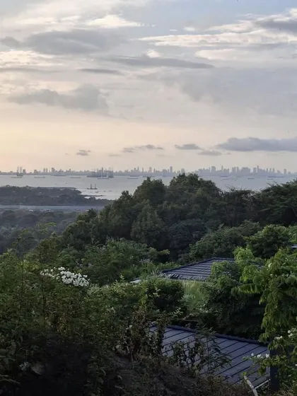 The view from Villa Toshi extends over the lush Alibaug canopy to the Mumbai skyline in the distance. The design of the home and garden is oriented to capture this unique juxtaposition of nature and city.