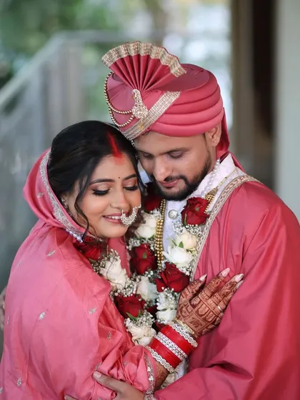A heartwarming photo of the couple. This was a two-states wedding, and I created a look that blended traditions beautifully.