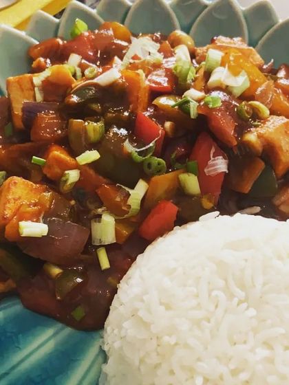 This is our Kung Pao Tofu, featuring soft tofu cubes and vegetables tossed in a savoury and slightly spicy sauce. We recommend pairing it with our Garlic Rice or Ginger Nutty Rice.
