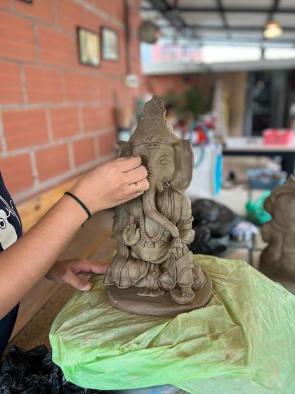 Glimpses from our Ganesha making workshops. You can see participants of all ages learning to sculpt, adding details, and bringing their beautiful idols to life under my guidance.