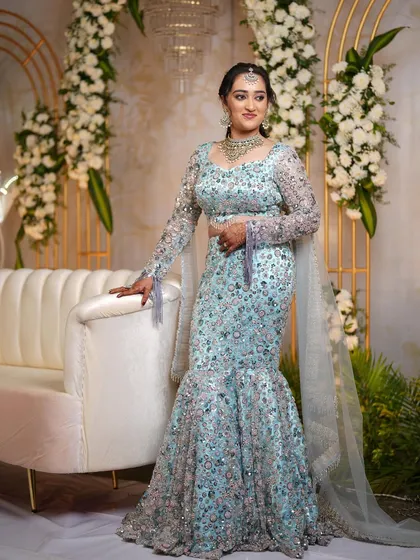 For a reception, you need to shine. I designed this stunning ice-blue mermaid-cut lehenga, fully embellished with sequins, for my client Supriya. It’s modern, glamorous, and made for a night of celebration.