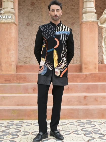 A frontal shot of the abstract art bandhgala, displaying the full pattern and the sharp, tailored fit.