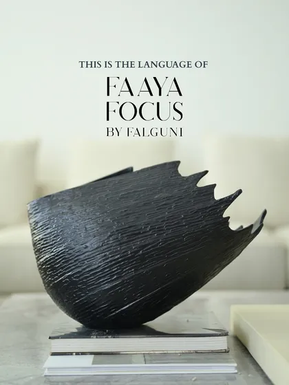 This is the language of Faaya Focus. Each piece is a statement, a sculpture designed to command attention and start conversations. This textured black vessel embodies our belief that home decor should be art.