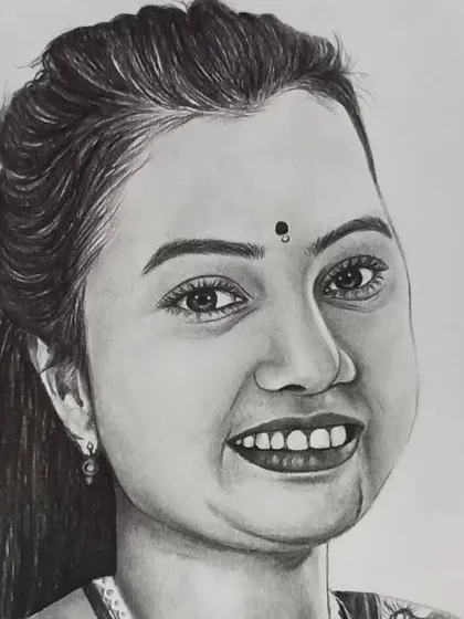 A close-up of the woman's smiling face from the same couple portrait, highlighting the bindi and the joyful expression I aimed to capture.