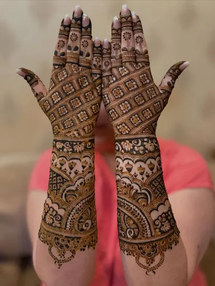 Celebrating a silver jubilee! This intricate grid design was created for a 25th wedding anniversary, proving that mehendi is for every celebration.