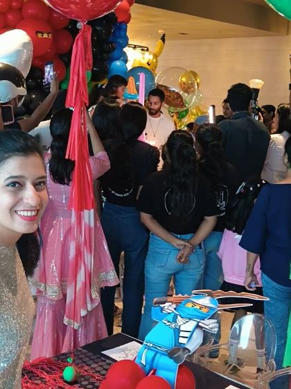 A quick smile for the camera before the cake cutting at Zain Kapoor's birthday bash. It was a room full of energy, balloons, and happy faces.