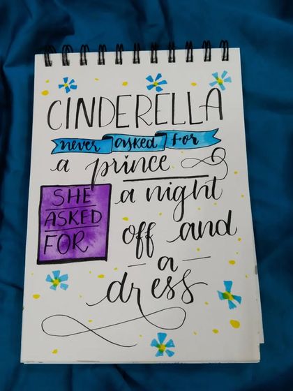 A playful take on a classic fairytale, this calligraphy piece reads, "Cinderella never asked for a prince, she asked for a night off and a dress."