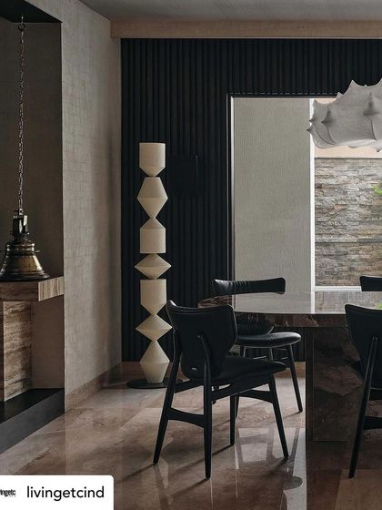 The dining area, showcasing the blend of modern furniture, traditional elements, and natural materials that defined this project for our Livingetc cover story.