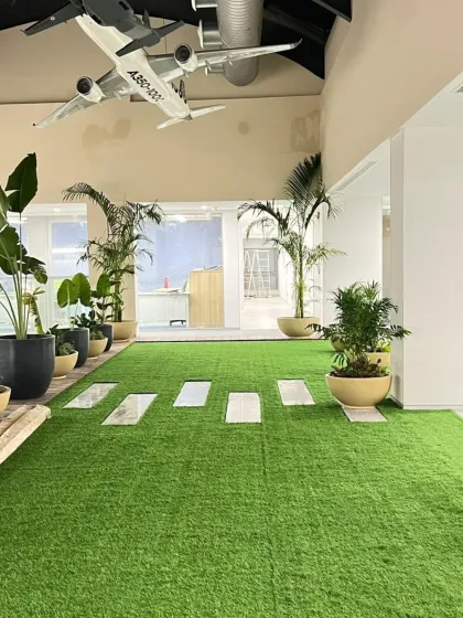 We excel in creating bespoke interior landscapes that reflect a company's unique culture. This project features a combination of artificial turf and carefully selected planters to create a dynamic, park-like atmosphere inside a modern office.