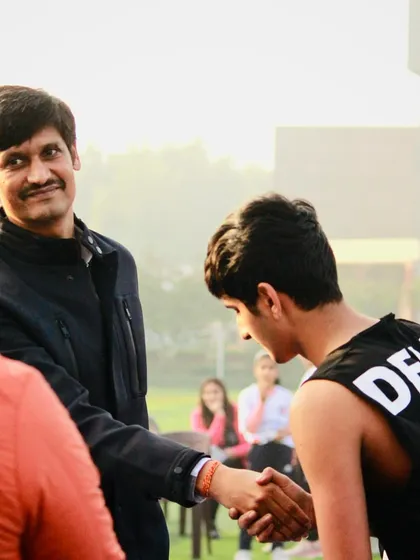 Mr. Mohit Bhandari sharing a handshake with one of our players. It's these personal interactions with mentors that can spark a lifelong passion for the sport.
