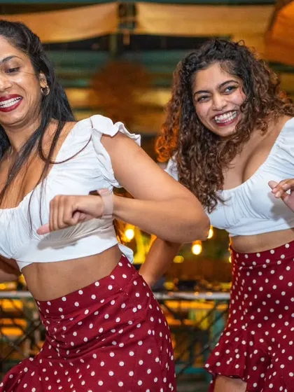 All smiles during their performance. You can see the joy and confidence that dancing brings.