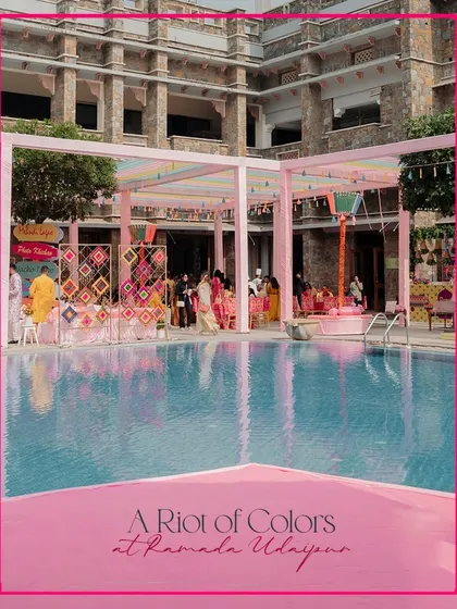 A riot of colors at the Ramada Udaipur. The poolside Haldi was designed with a lively and quirky vibe, using a pastel theme with vibrant pops of color from props and florals.