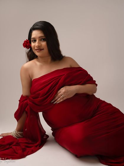 A direct, smiling gaze that is so warm and inviting. This portrait captures her sweet and gentle personality perfectly.