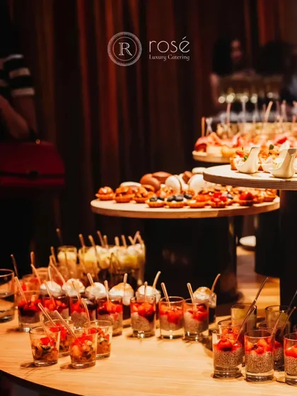 A view of our appetizer and dessert station, featuring dessert shots and canapés. We create a symphony of flavors, crafting unforgettable experiences one plate at a time.