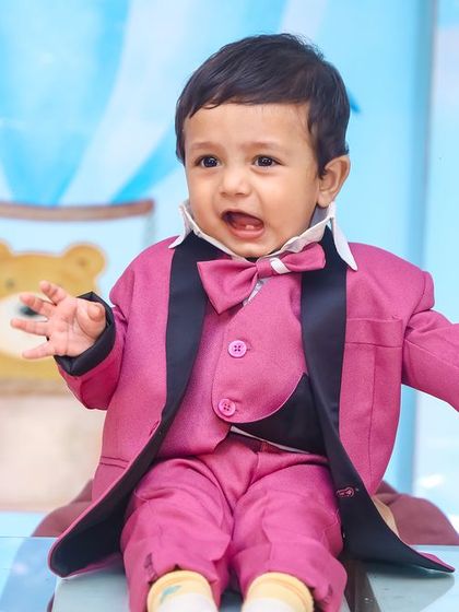 A magical 'Frozen 2' themed birthday party, transforming the venue into an enchanted forest with earthy tones, character cutouts, and shimmering backdrops.