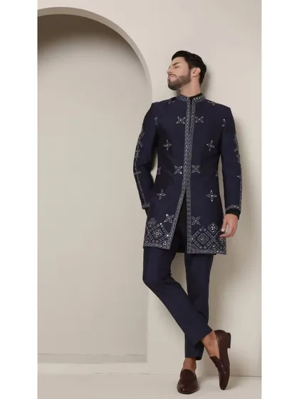 Another angle of the Neel Amber achkan, highlighting its structured fit and the way the mirrored details catch the light. This is the achkan, redefined.