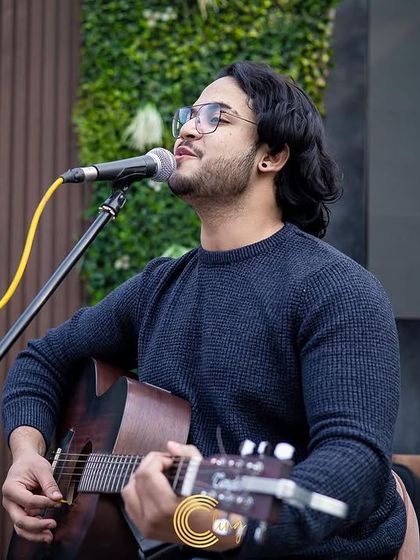 A clear shot of me performing outdoors for a daytime event. My setup is completely portable, making it easy to perform in any location.