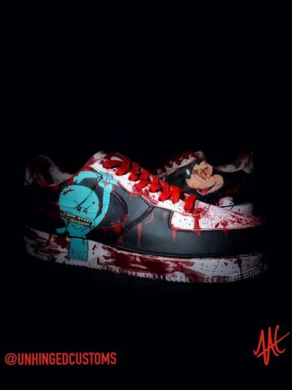 A dark shot of the Mickey Mouse side, with the blood-red laces adding to the gory theme.
