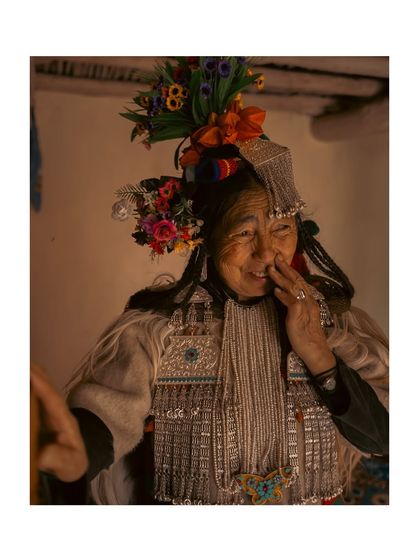 A candid, joyful moment with a Brokpa woman. Her laughter is infectious, and the photo captures the warmth and welcoming spirit of the people of Ladakh.