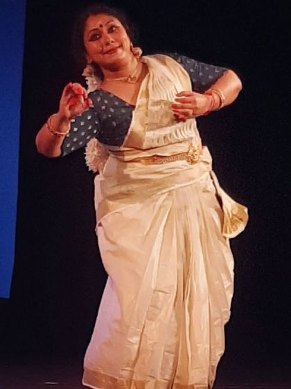 A dancer embodies the theme of transition, showcasing the evolution of our style of Mohiniyattam.
