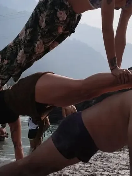 Teamwork makes the dream work. Each person in this plank stack is crucial for maintaining the structure.