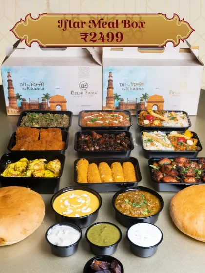 Our Iftar Meal Box, priced at ₹2499, serves 5-6 people. It's a lavish spread that includes a variety of starters, gravies, biryani, breads, and desserts, perfect for a family Iftar.