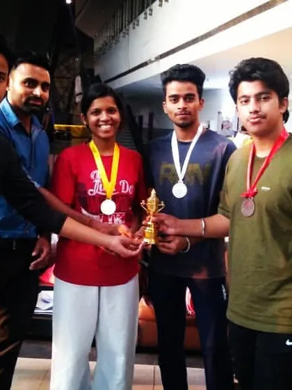 Proud moment with Team Warriors after a competition. Their hard work paid off with medals and a team trophy. Shaabaash!
