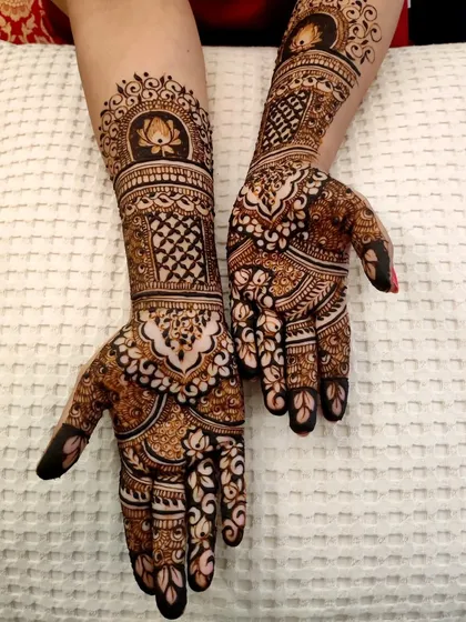 A different angle of this stunning Diwali henna, showing the beautiful flow of the design from the palm to the forearm.
