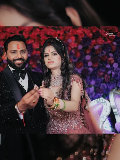The moment of the ring exchange. This photo captures the couple proudly showing off their new rings to the camera, a key moment from their engagement ceremony.