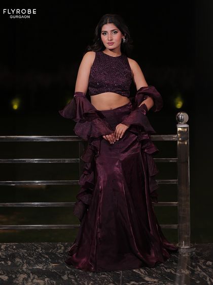 Why buy when you can slay in style and return it? This purple lehenga is a showstopper, and it's available for you to rent for your next big event.