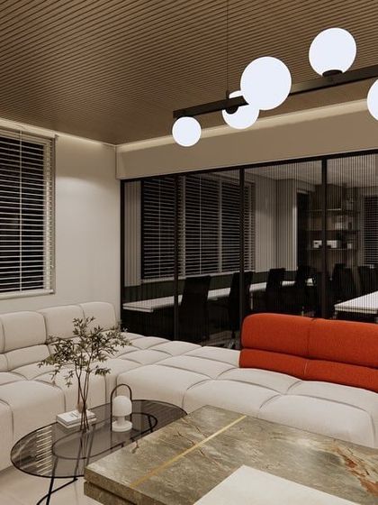 Duplicate of 102. This render shows the view from the executive desk looking out into the open office. The modern, globe-like chandelier adds a sculptural element to the space.