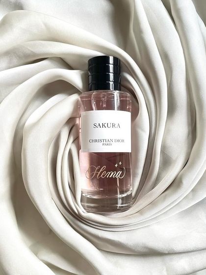 A different view of the engraved bottle for Hema Malini, showcasing the classic beauty of the product and the personalization.