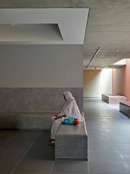 A waiting area in an eye clinic in Gujarat is illuminated by a series of skylights. The design provides a calm and reassuring environment, where the changing quality of natural light offers a connection to the outside world.