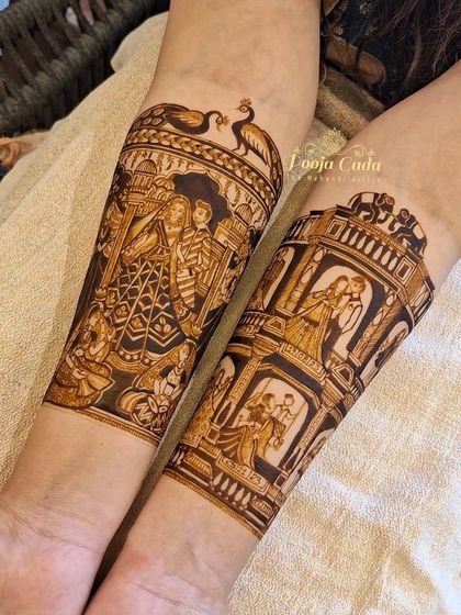 A close-up of the heavy bridal figures, showing the incredible detail in the couple's attire and the architectural elements surrounding them.