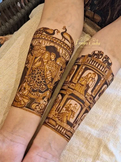 A close-up of the heavy bridal figures, showing the incredible detail in the couple's attire and the architectural elements surrounding them.