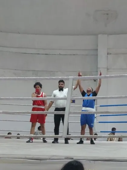 This is what domination looks like. Here is my fighter Sheza, after winning the gold medal at the boxing nationals. We build complete fighters from the ground up, and her victory is a testament to the hard work and technical skill we instill in every athlete.