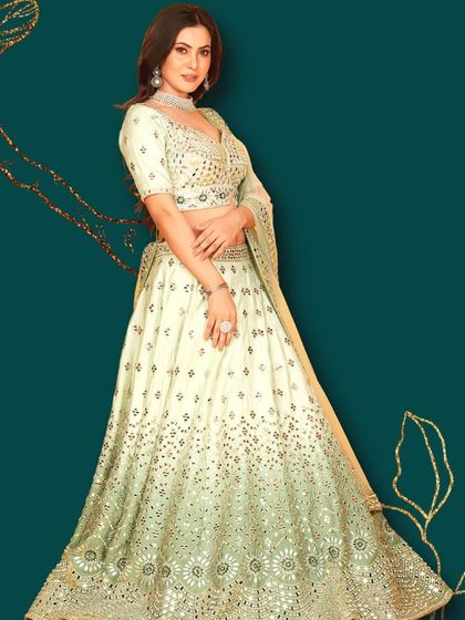 This pastel green lehenga is perfect for any occasion where you "don't have anything to wear." It's a versatile and stylish choice that you can rent for any event.