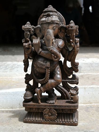 A recently sold 24-inch Flute Maha Ganapathy. This rare depiction of Ganesha playing the flute showcases our ability to create unique and artistic interpretations of traditional forms.