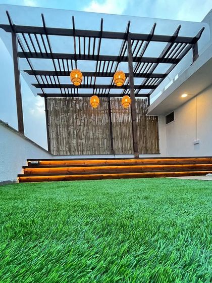 A low-angle view highlighting the integrated LED strip lighting in the steps. This feature adds safety for evening use and provides a sophisticated ambient glow to the entire space.